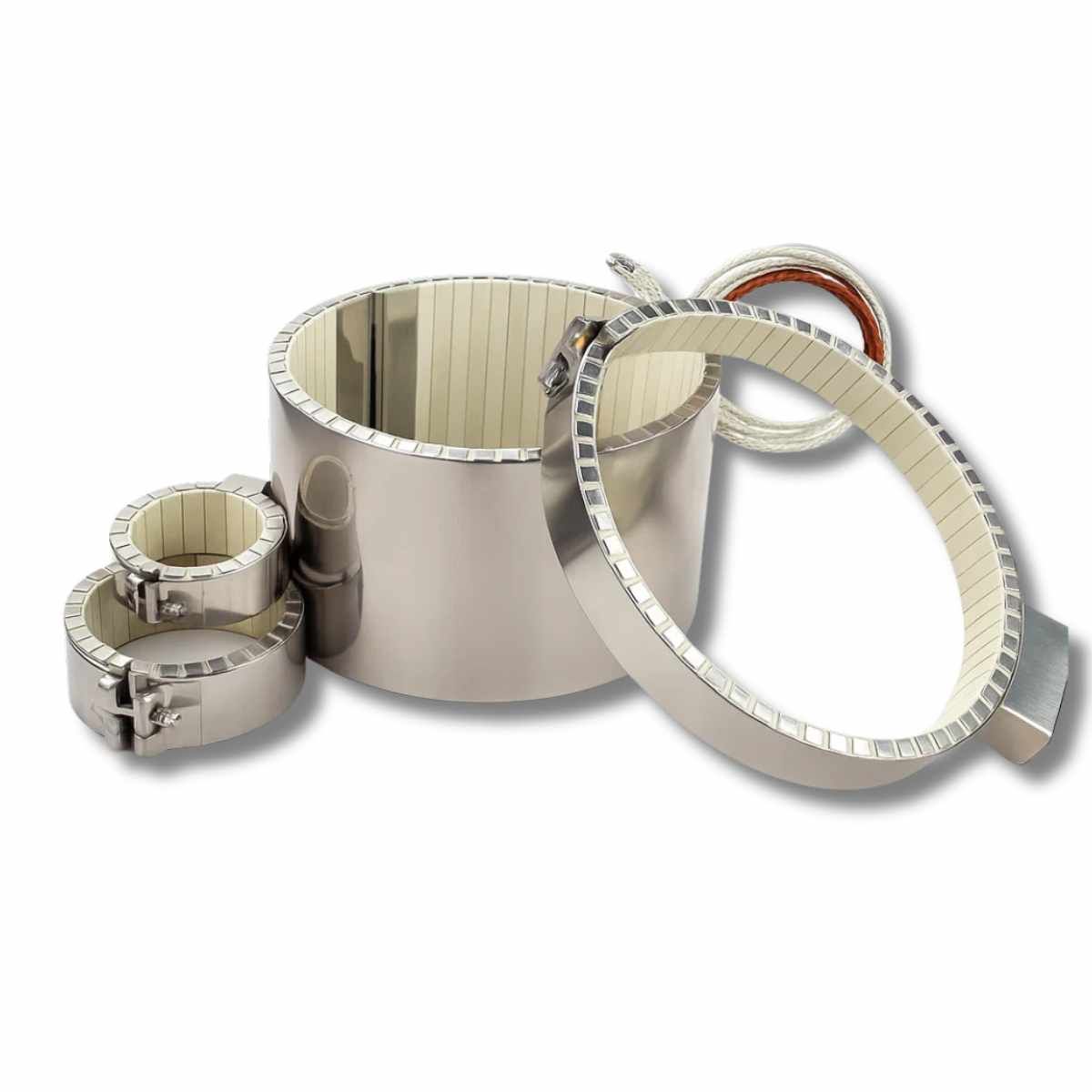 Three ceramic band heaters of different diameters, the ceramic tiles visible inside the steel band.