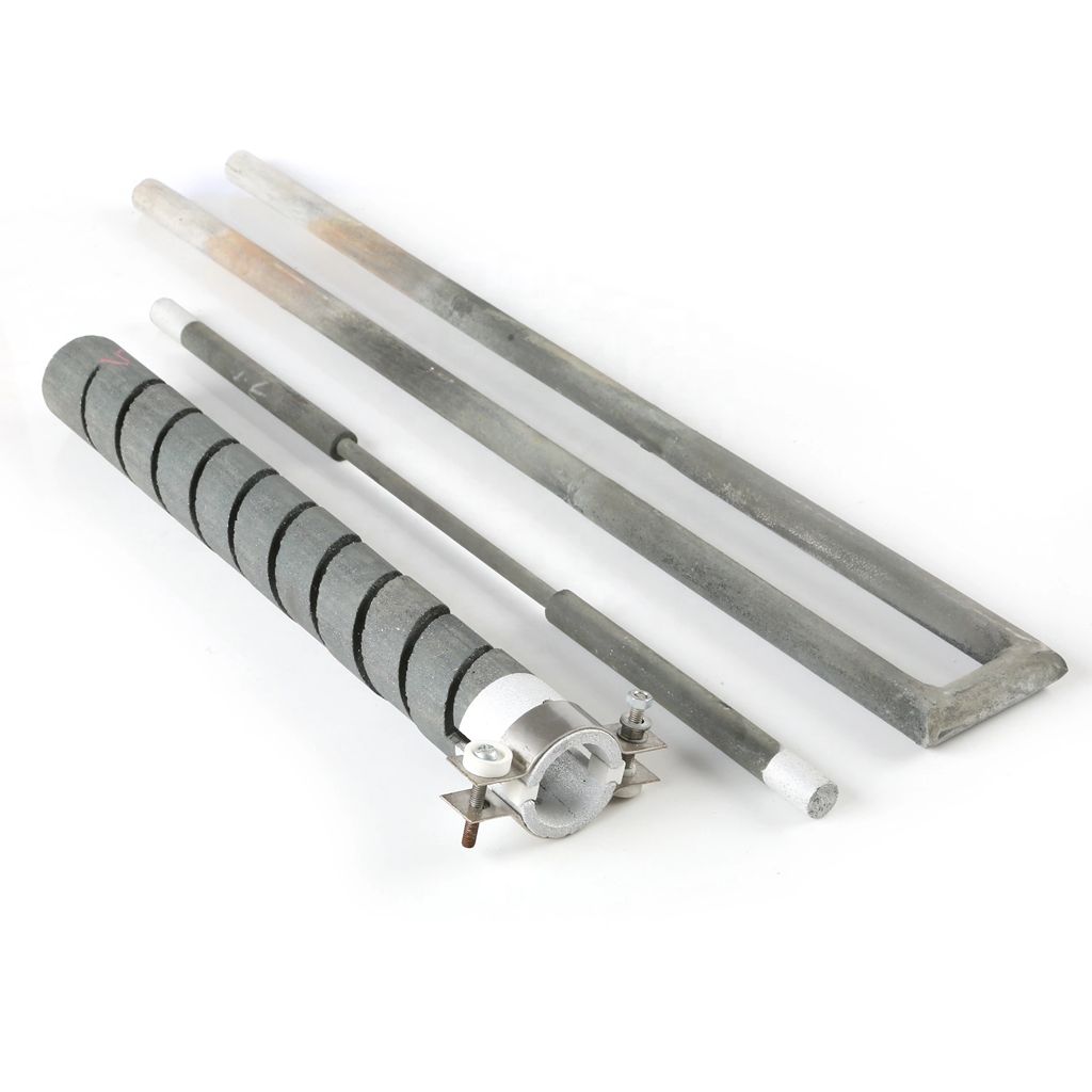 A spiral-cut silicon carbide rod beside straight rods and a U-shaped element.