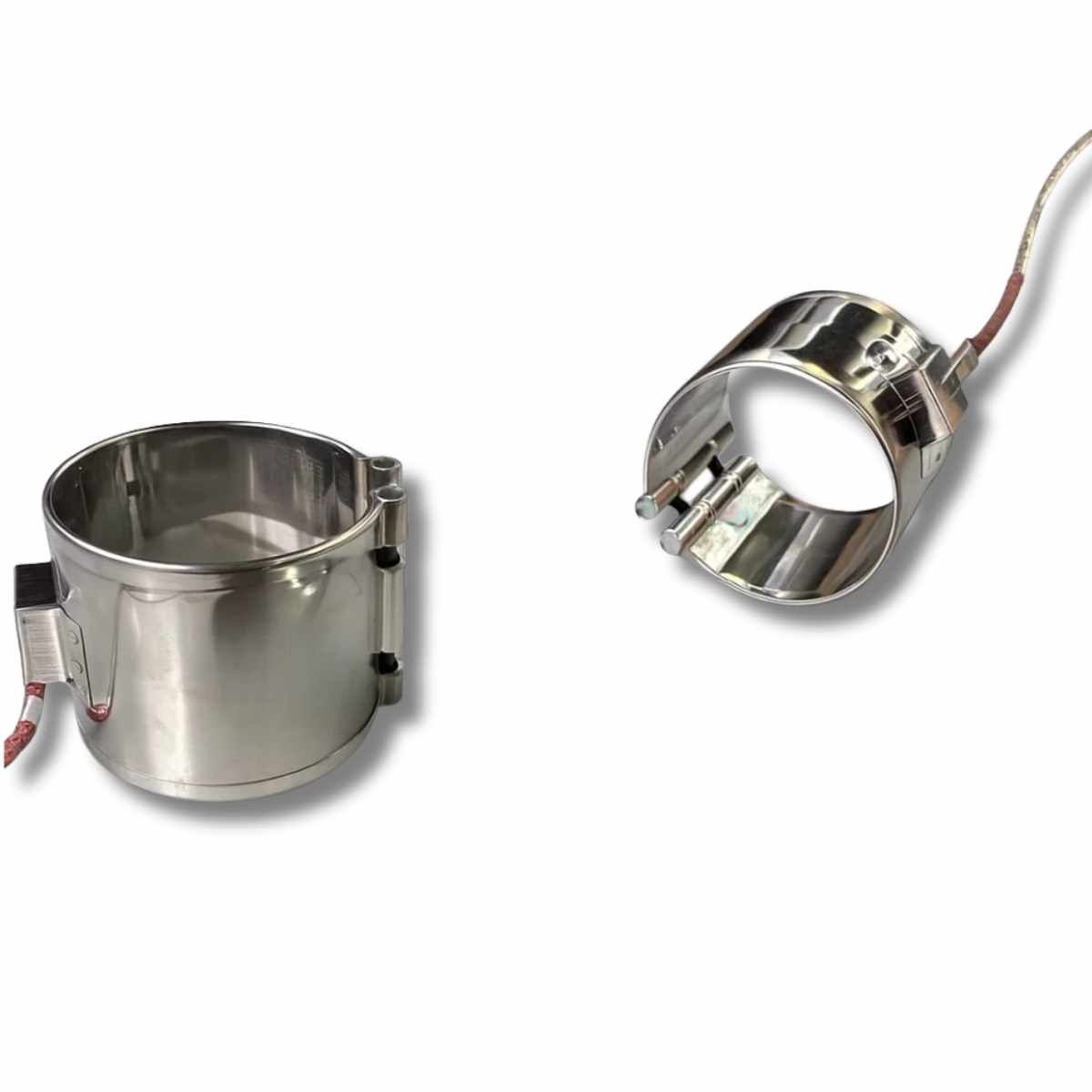Two mica band heaters in polished stainless steel, one open at its clamp.