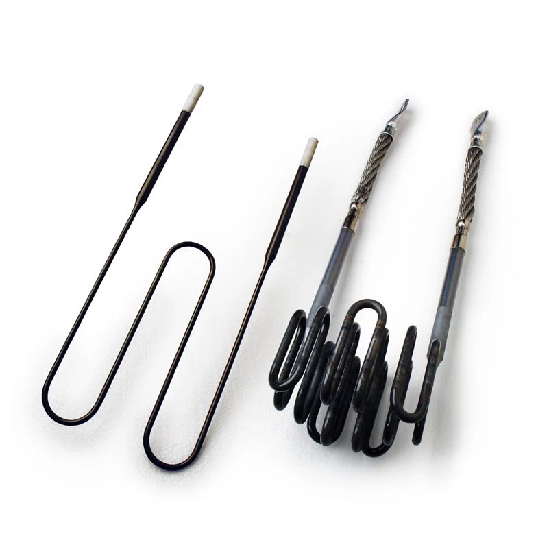 Molybdenum disilicide elements: two thin hairpins, and two with braided terminal straps above a coil.